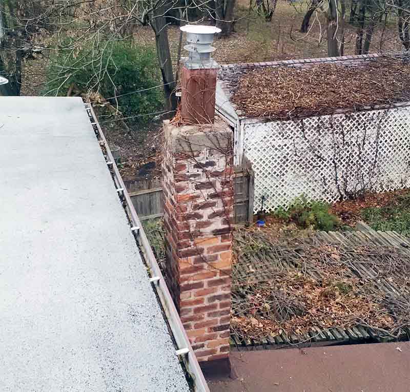 chimney with vines wrapped around